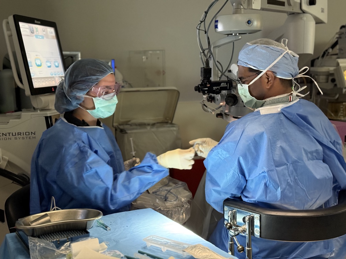 Dr. Harish Raja working with the surgical team